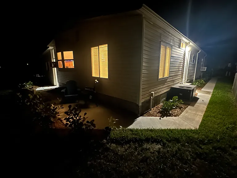 Door next to the light is your entrance to laundry.