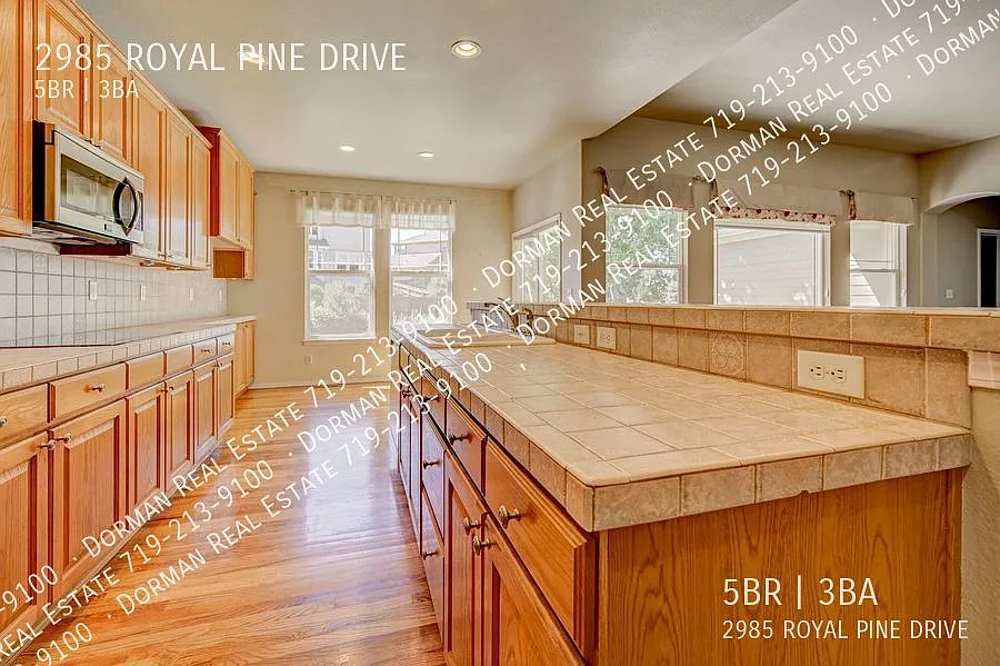 Come see this 5 Bedroom Pine Creek Rancher w/Finished Basement! — Photo 3