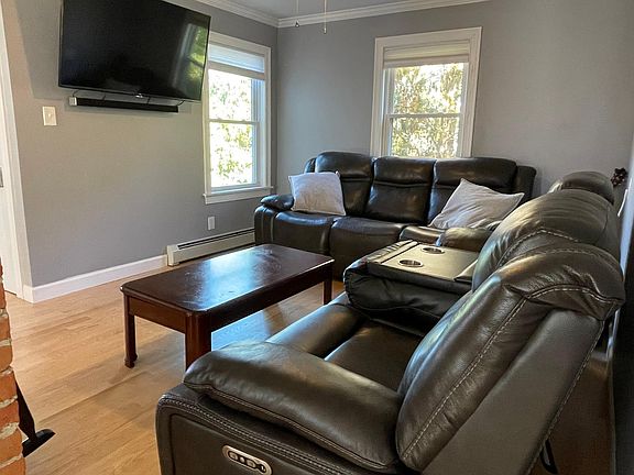 Living room with wall mounted for tv