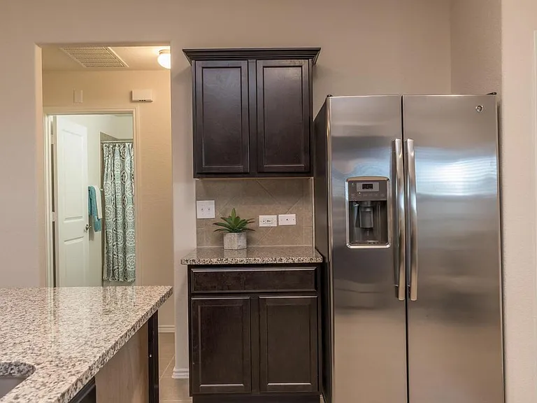 Kitchen with plenty of storage, pantry and brand new stainle