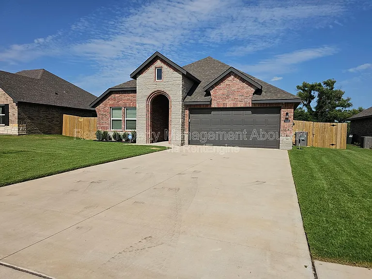 7505 N 155th East Ave — Photo 2
