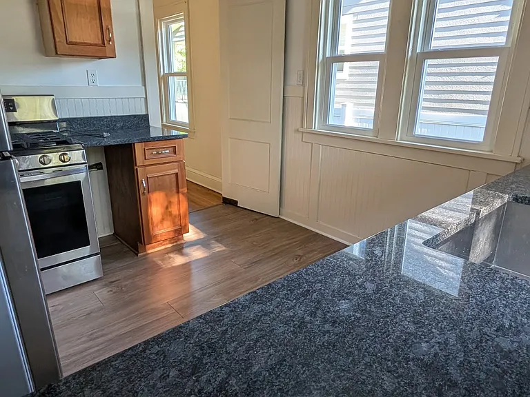 579 Eustis St — Photo 12