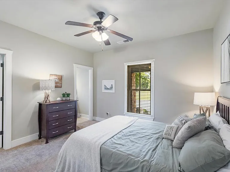 Spacious private bedrooms with natural light at The Cottages of Hattiesburg.