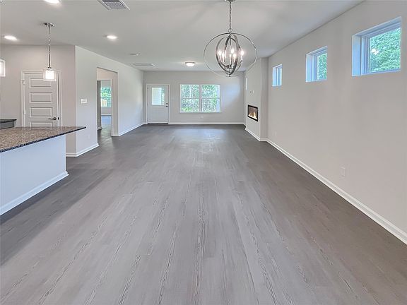 The Robin II- Dining Area into the Family Room. Home under construction. Sample floor plan photo us