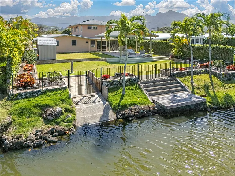 Arial view of the canal, gated boat launch and dock.