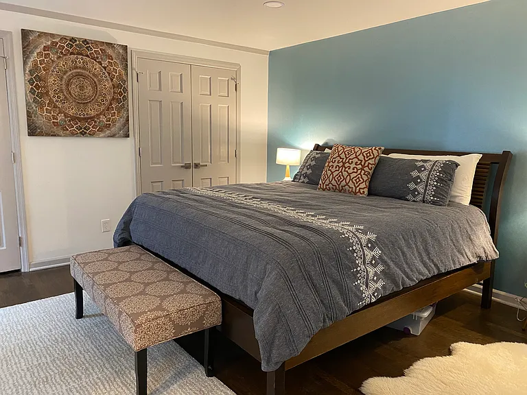Upstairs master bedroom with a private ensuite _ comfort and privacy combined.
