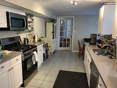 Kitchen (shown door is entry to den)