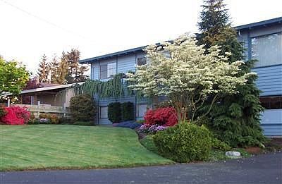 Immaculate well-cared for home with mature landscape. Open floor plan with many updates. Close to ev