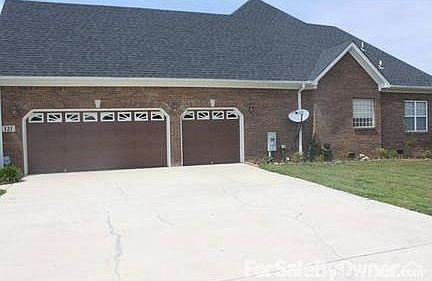 Garage
						:
						Deep for Full Size Extended Trucks. Custom Brick Flower Bed Border.