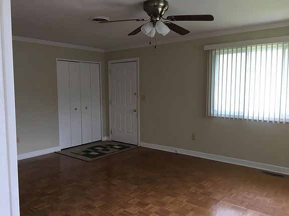 Looking at Entry door and livingroom closet from Living room