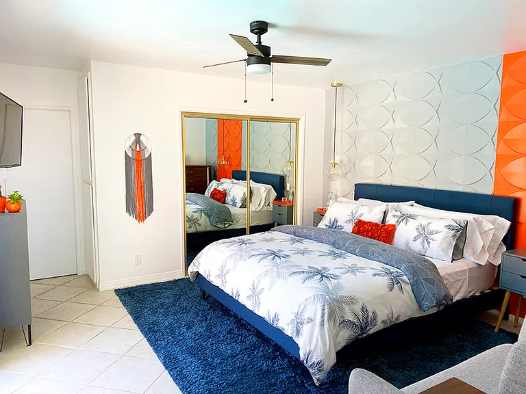 Orange Bedroom: California King size bed, ensuite bathroom, pool view and access