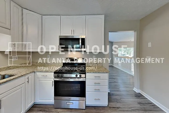 4504 Rushing Wind Ct — Photo 6