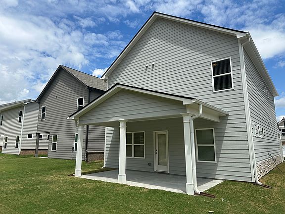 Back of Home with Covered Patio