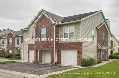 11611 Tomahawk Creek Parkway #L — Photo 1