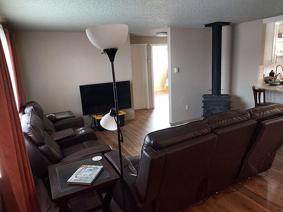 Living room, wood stove.