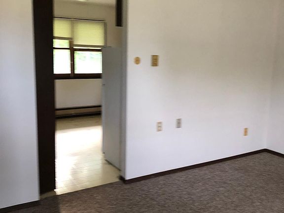 Living room looking into kitchen