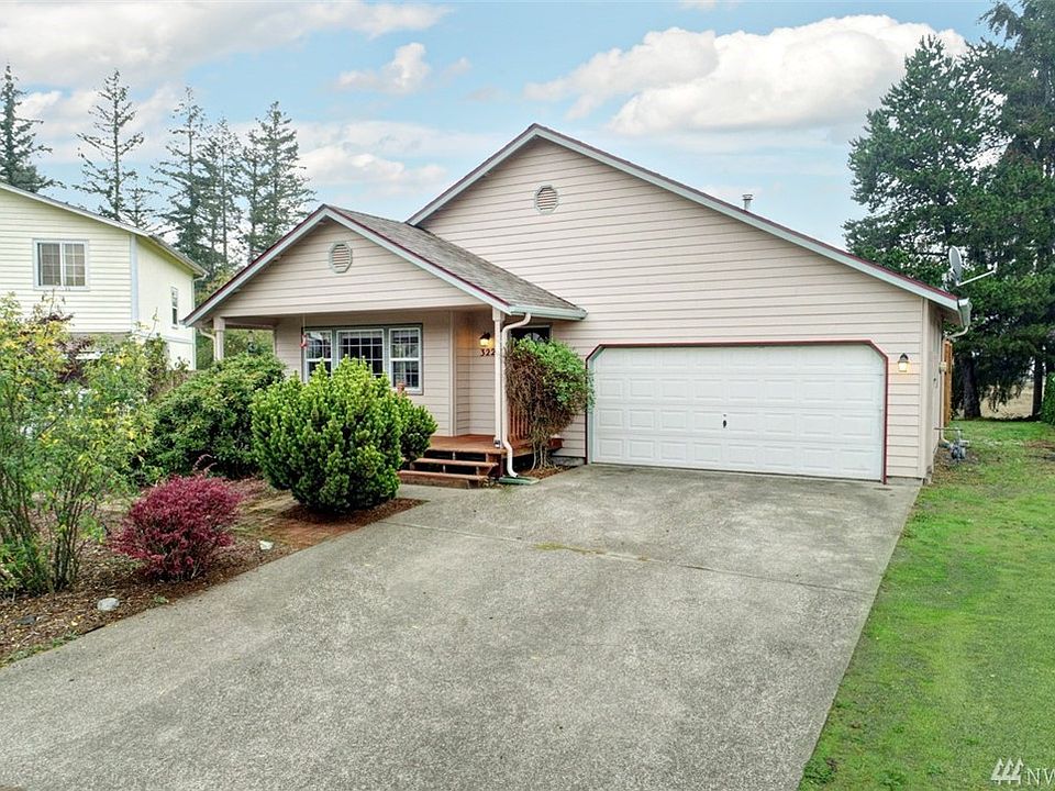 Adorable Rambler with 2 car attached garage and covered front porch, welcomes you home!