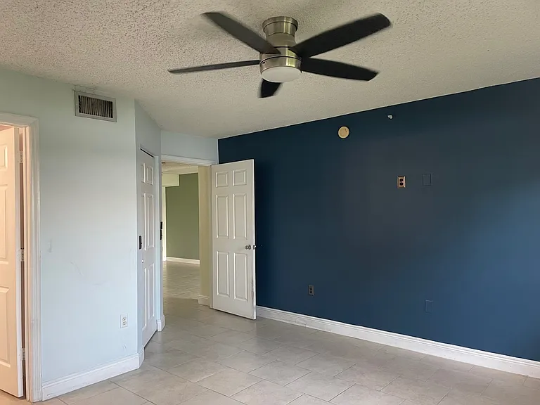 5005 Wiles Rd #102 — Photo 8