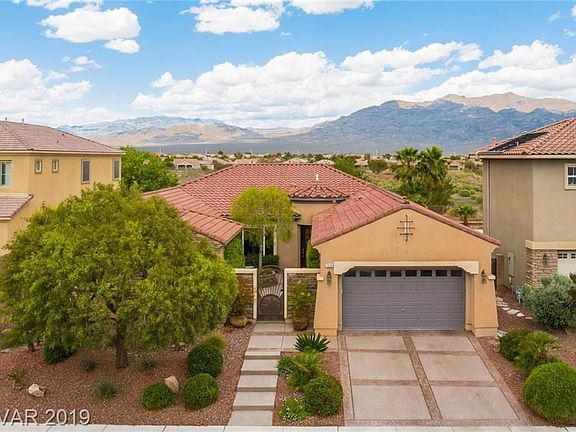 Front gated courtyard and immaculate mountain views to the north.