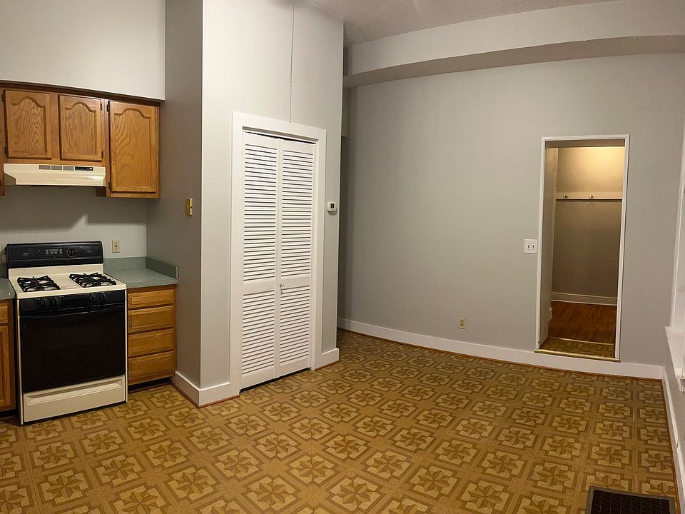 Kitchen / living room combo facing entry hall. Laundry located off of entry hall.