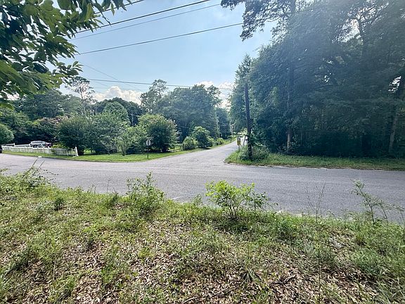 Elevated vantage point offers clear sightlines to the road. Paved, low-traffic streets provide a safe and quiet setting.