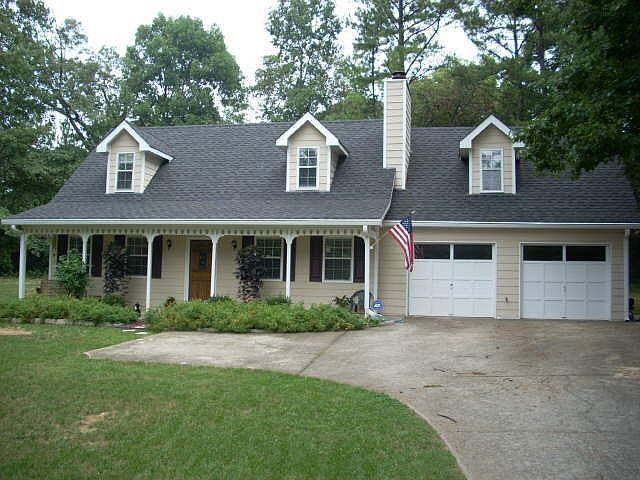 Gorgeous Cape Cod with fresh exterior paint and new roof.
