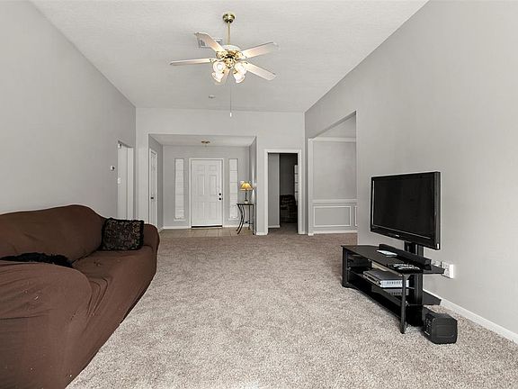 Another view of family room looking back at the entryway.