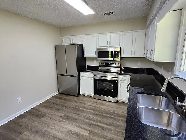 7847 Sugarland Dr — Photo 4