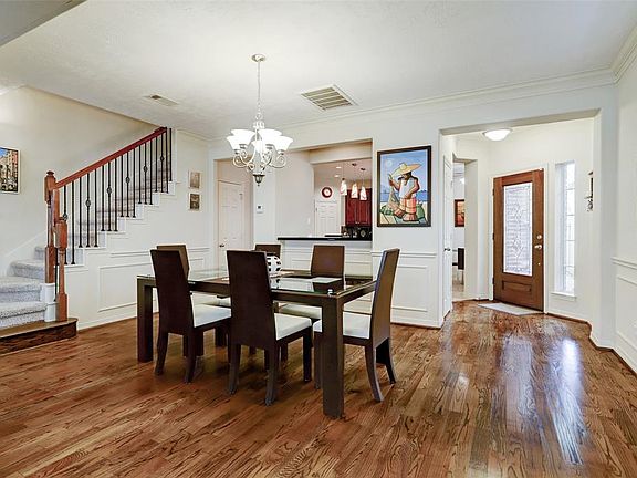 Greeted with pristine hardwoods and custom millwork. First floor living makes this home a true treat. This floor plan is design for that ever so changing lifestyle. The dining room and living can host an array of furniture placement.