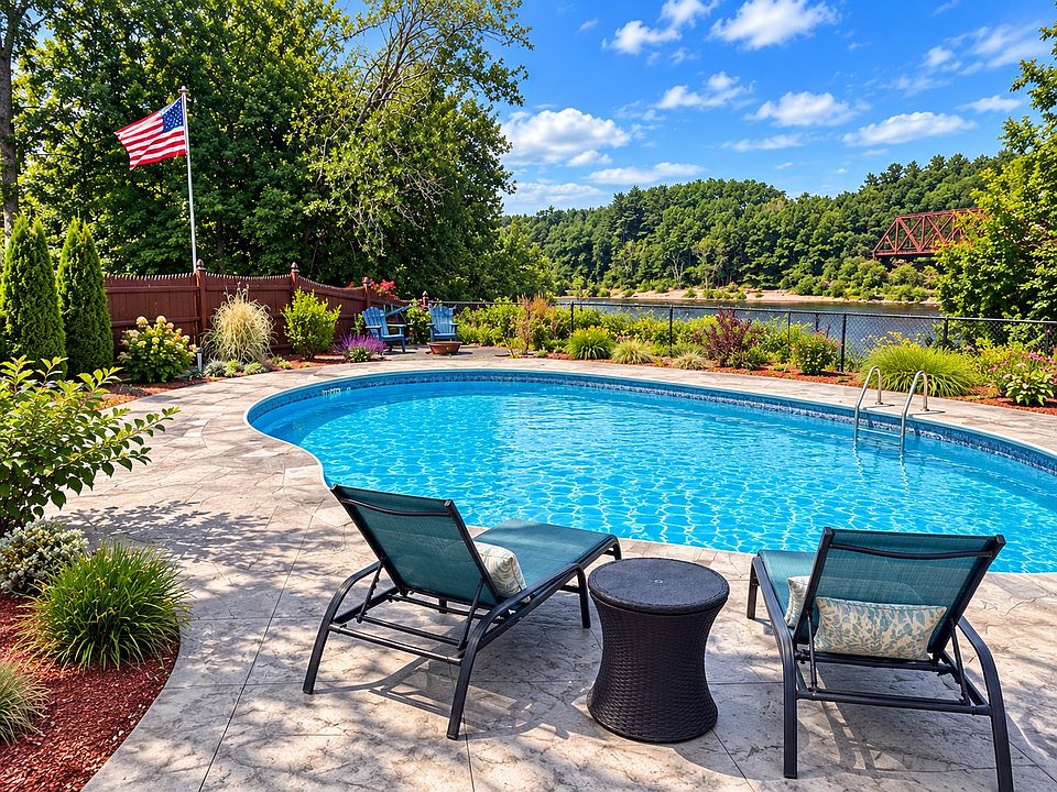 Your Private Riverfront Retreat! Enjoy your own inground pool overlooking the beautiful Merrimack River.
