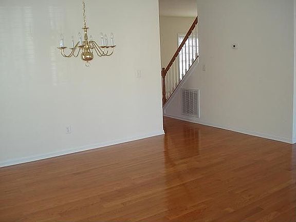Dining room with hardwood floors.