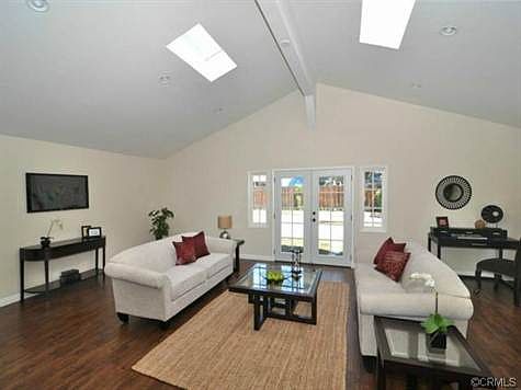 Sunken living room with skylights