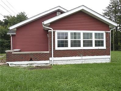 Front of building, west - this is the side that faces Shadeland Ave. To the left is another entrance into the building.