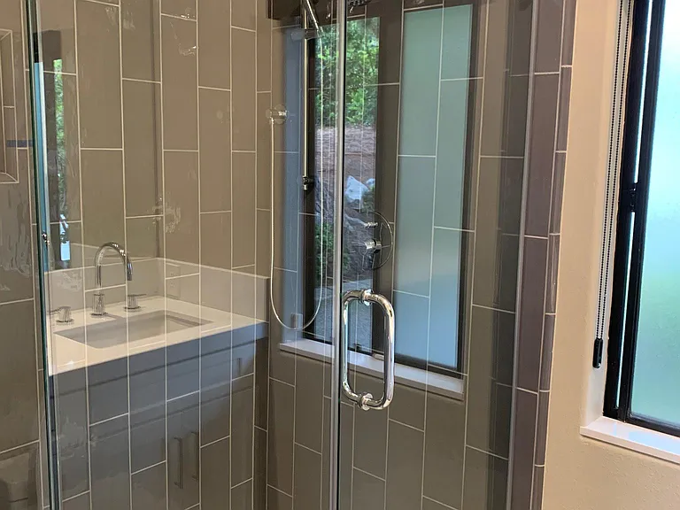 Custom built shower with handsome tile.