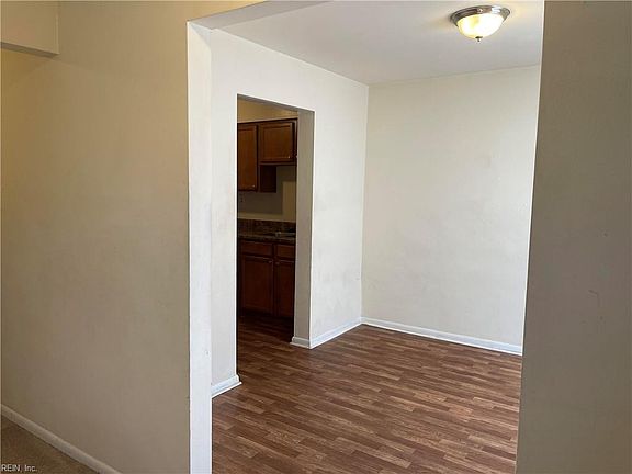 Dining room leading to kitchen
