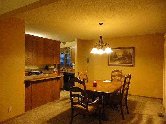 Formal dining room.  Open to living room.