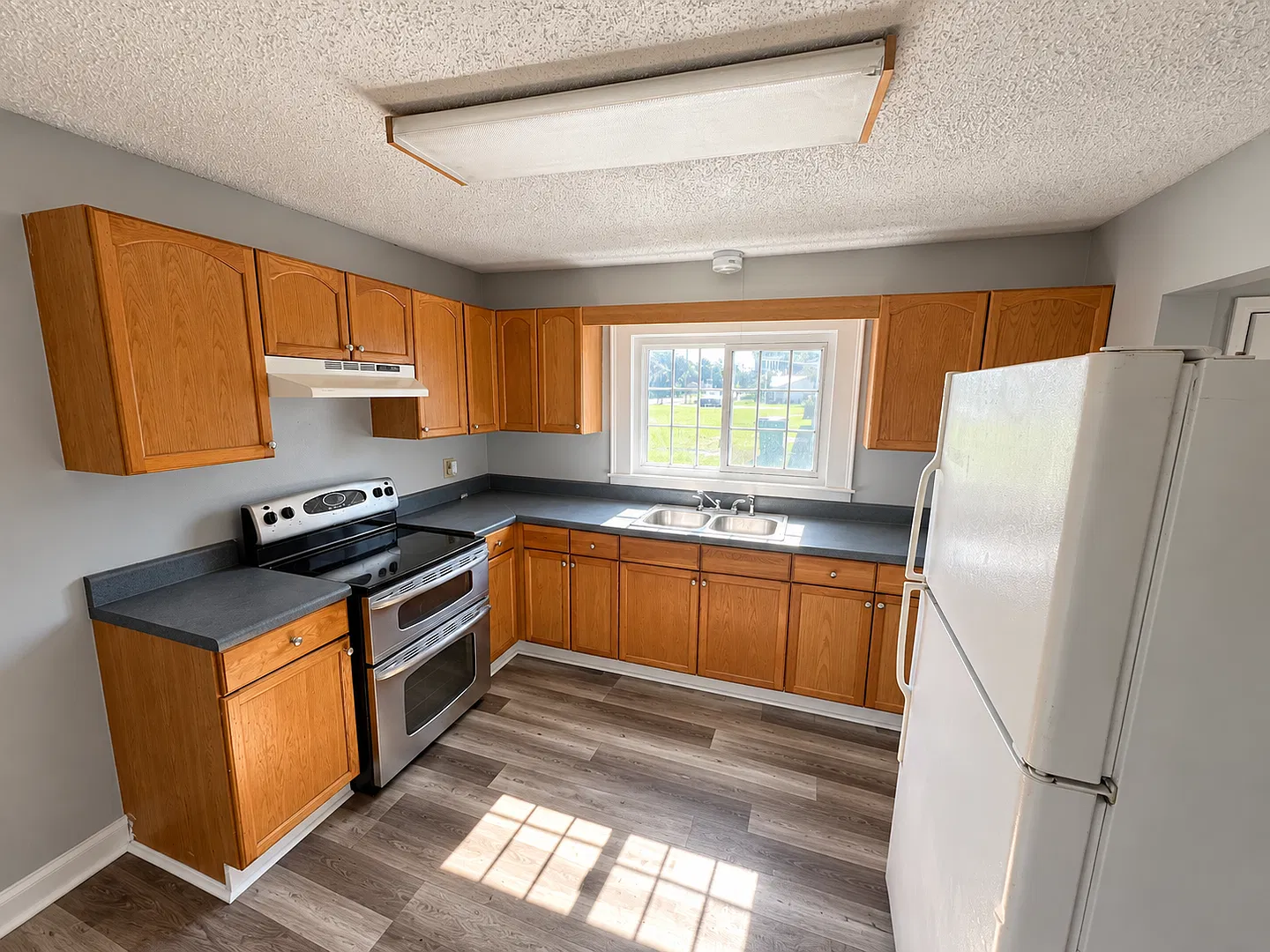 Spacious 3BR/2BA Home w/ HUGE Kitchen, Den & Large Carport! — Photo 3