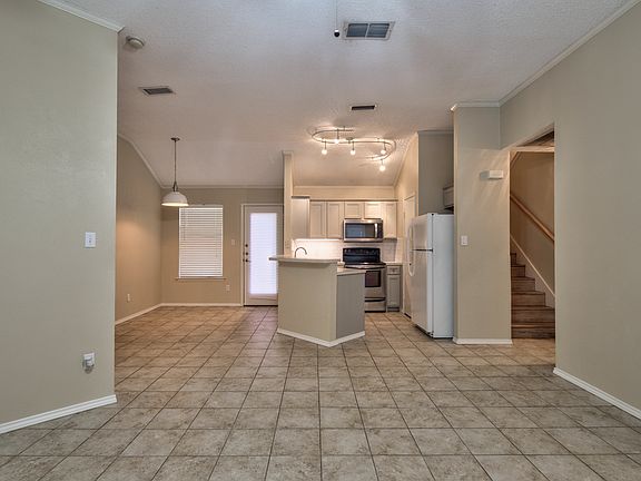 View from living area to kitchen and dining areas
