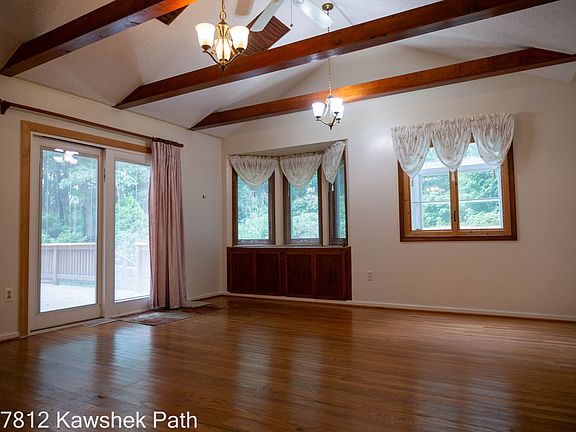 Beautiful sunny family room with built-in miniature greenhouse for year round flowers and fresh herbs.