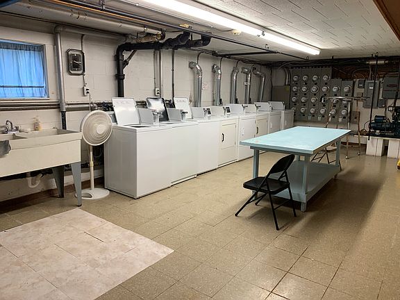 Coin operated laundry inside the building