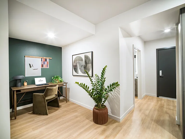 Work comfortably from home in thoughtfully designed spaces at Modera Shoreline, blending modern style with functionality for your daily routine.