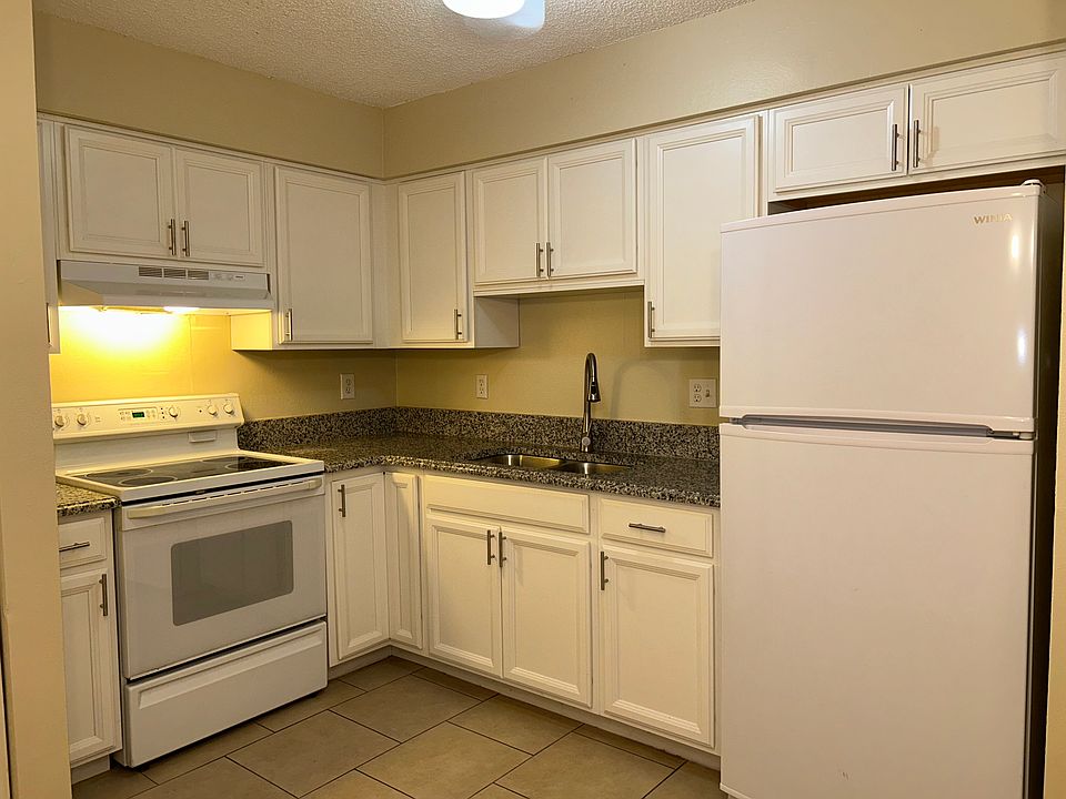 Kitchen with new cabinets, faucet, and new refrigerator