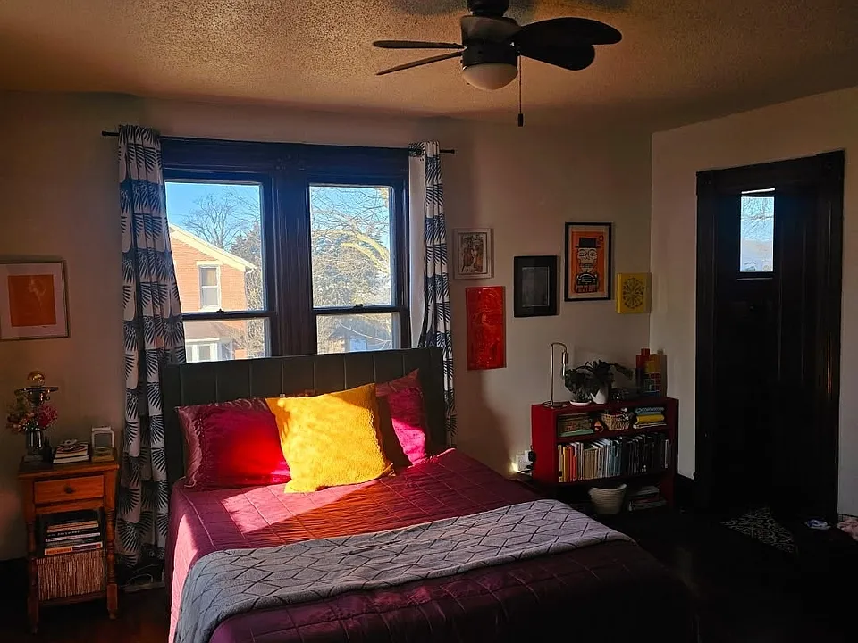 Primary bedroom with walk-in closet to right