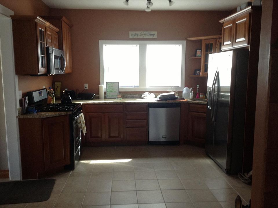 Cherry kitchen with newer appliances