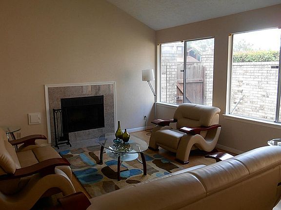 Lots of natural light around the gaslog fireplace!