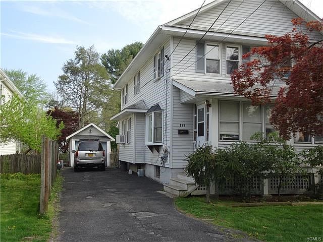 Left side, 199 Rockledge, separate entrance, private driveway and 1 car garage.
