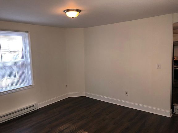 Alternate view- Comfortable living room with coat closet. N