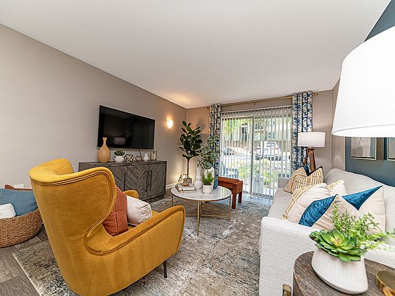 Spacious living room with hardwood-style flooring