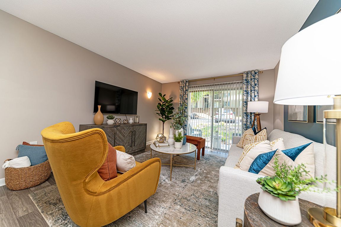 Spacious living room with hardwood-style flooring
