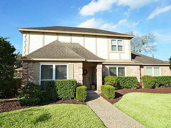Covered Front Porch Entry into this 5-Bedroom Home